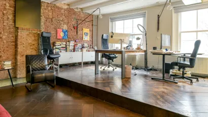 Office with brick wall rapenburgerstraat