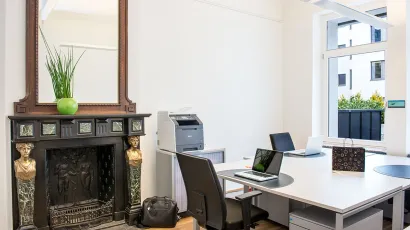 Three person private office with authentic fireplace