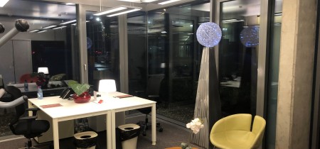 spacious two person office with private informal meeting table