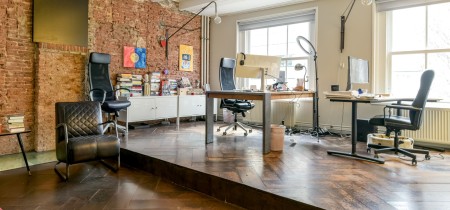 Office with brick wall rapenburgerstraat