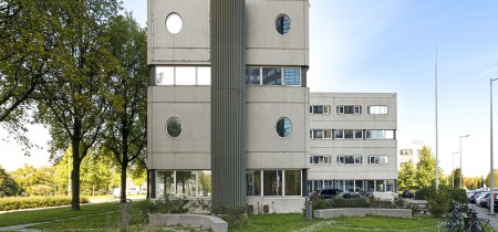 building with green park donauweg