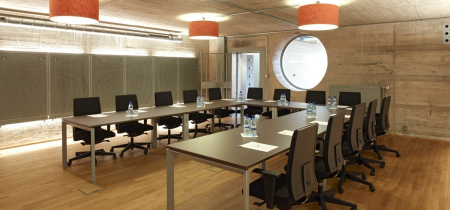 Spacious boardroom for presentations fourteen people