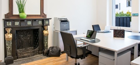 Three person private office with authentic fireplace