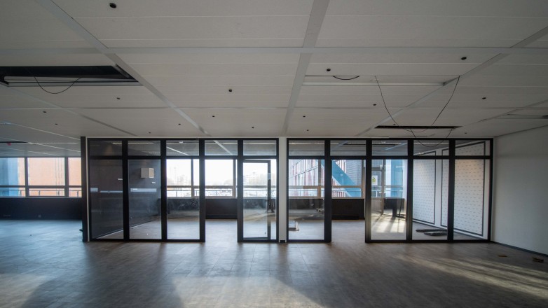 large conventional space with private offices Bos en Lommerplein