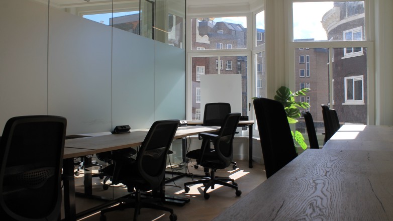 office space with desks and chairs spuistraat