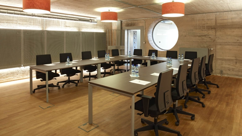 Spacious boardroom for presentations fourteen people