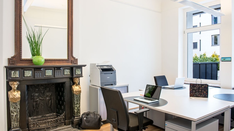 Three person private office with authentic fireplace