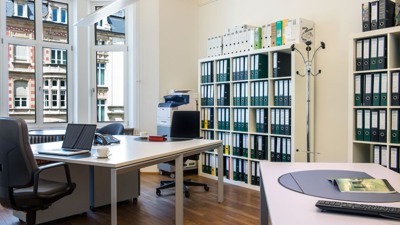 Private office three people with file cabins