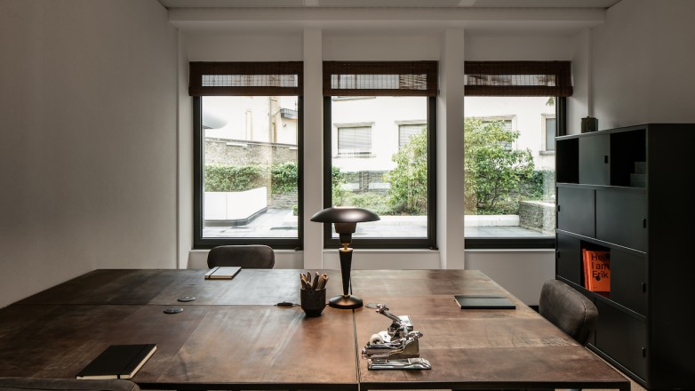 Private office three people with leather coated desks